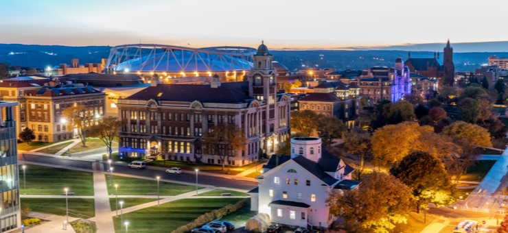 Aerial view of campus at dusk displayed in a new window