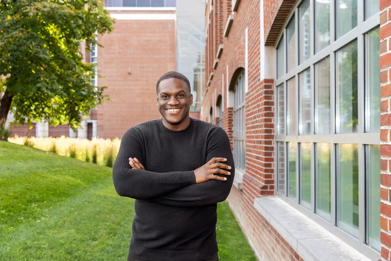 Jamal Salmon outside standing near building