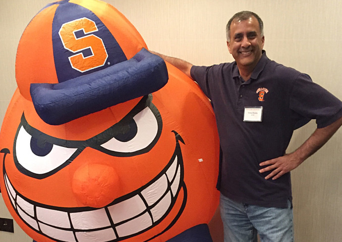 Vishal Shukla standing next to an inflatable Otto